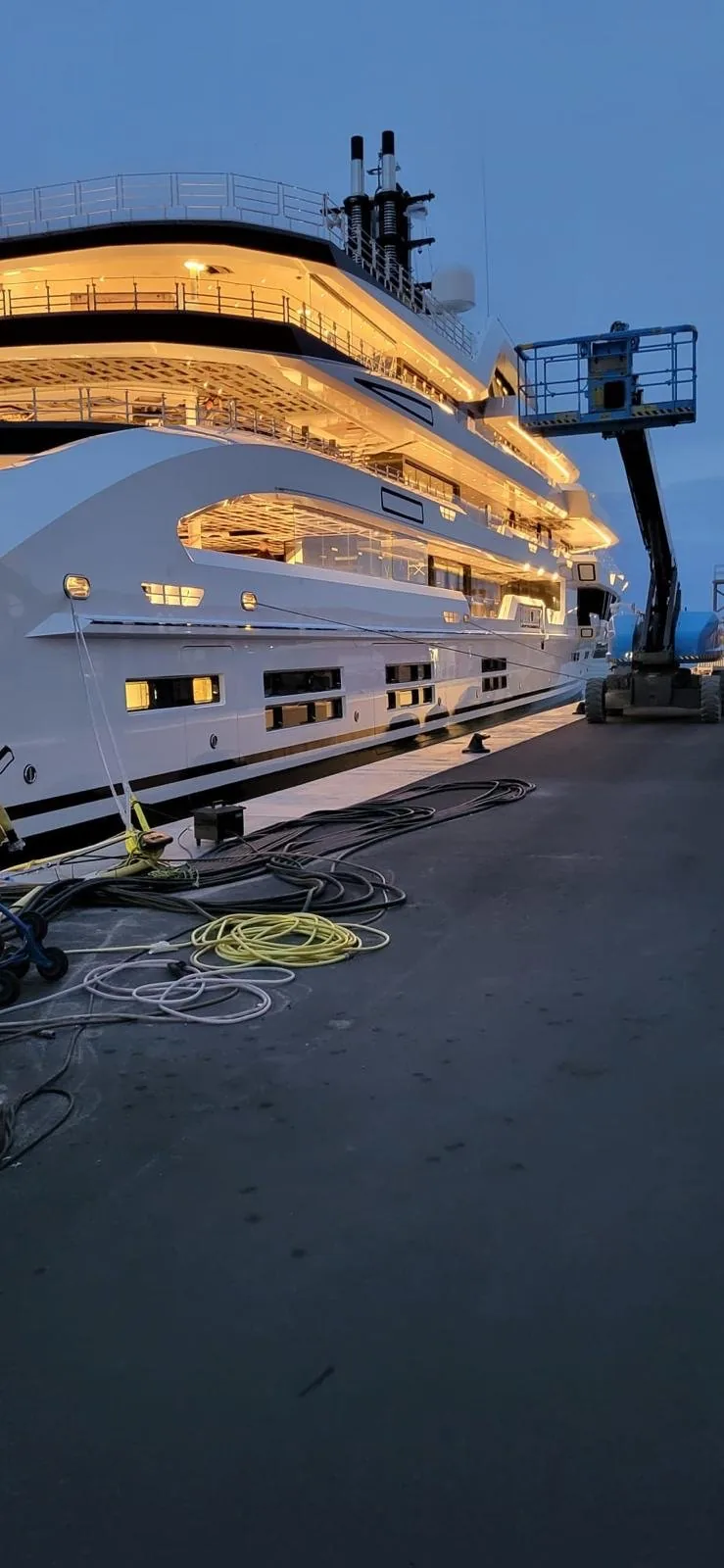 Night view of a yacht and deck railings