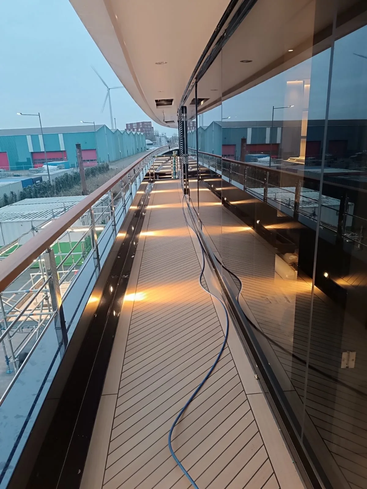 Illuminated side passage with handrails