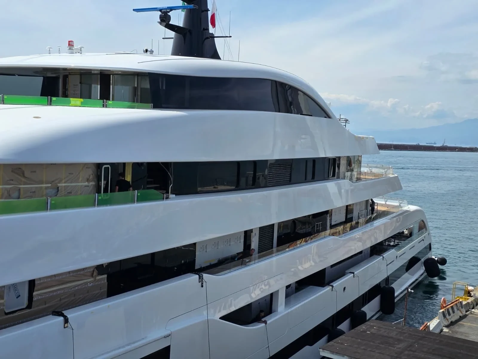 Luxury yacht side with stainless steel elements