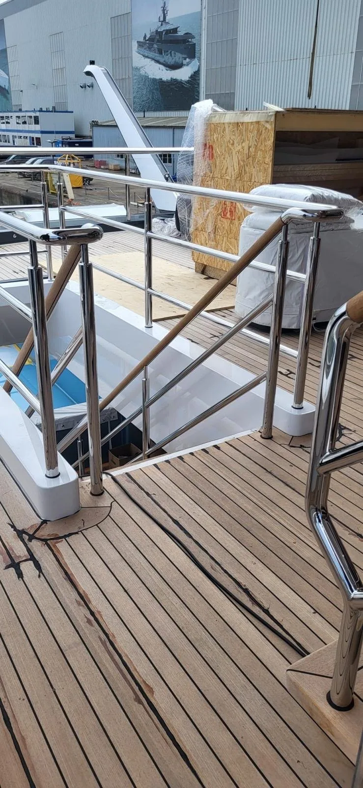 Railing detail with glass panel infills