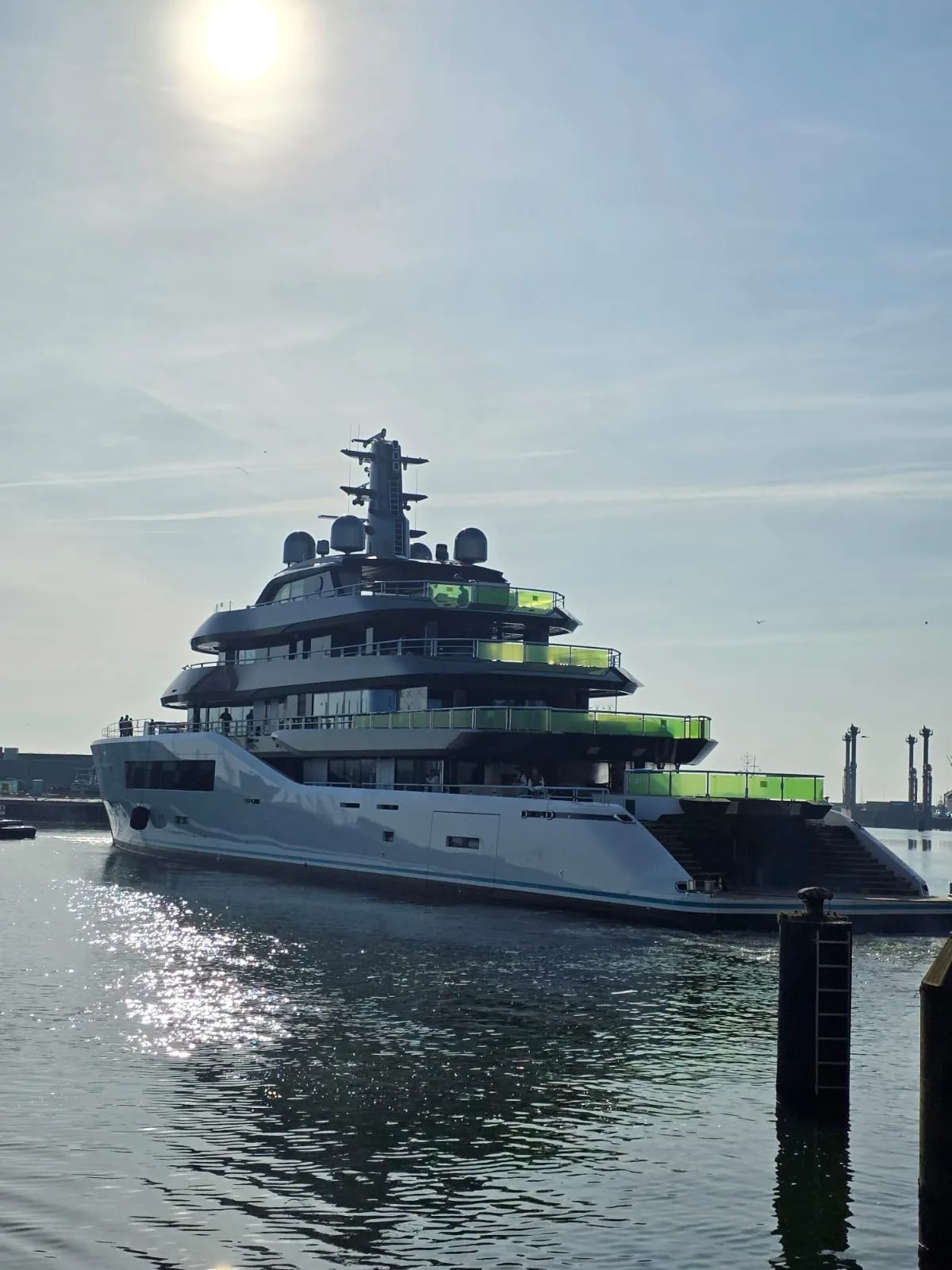 Yacht on water with visible deck railings