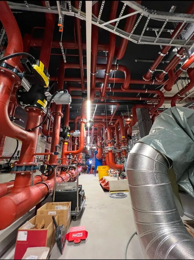 Pipework installation inside a technical plant room