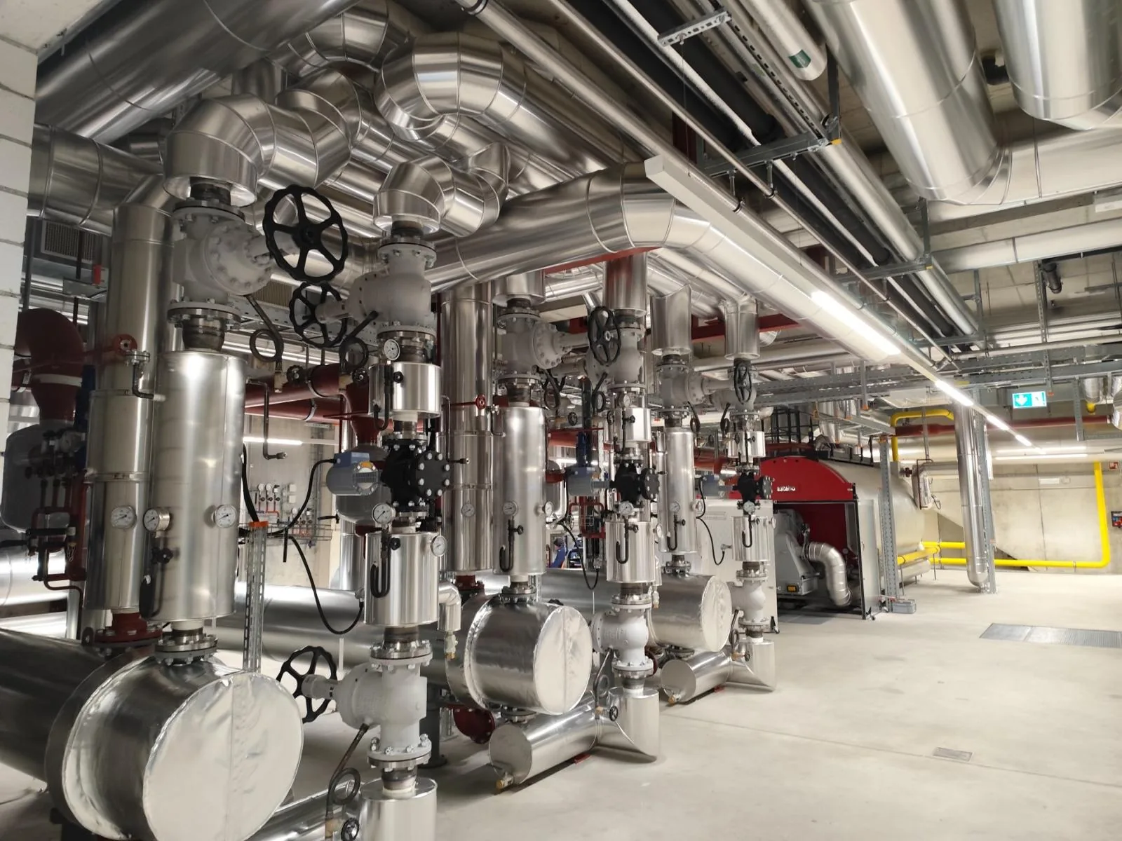 Mechanical room with insulated pipework