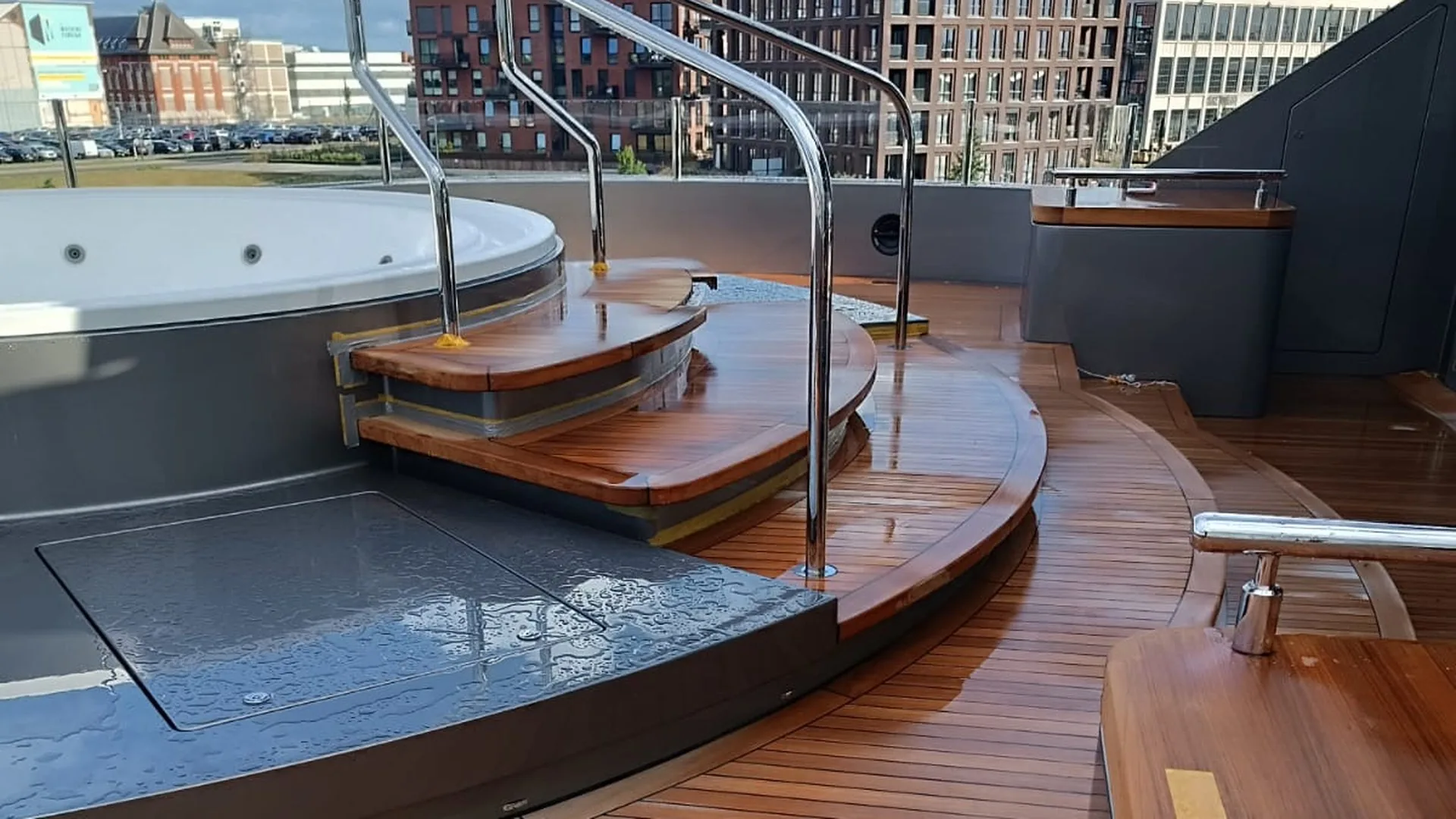 Polished stainless steel handrails and railings on a yacht deck